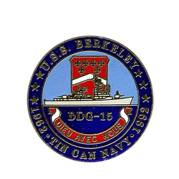 A blue and red pin with the words " uss berkeley ddg-1 5 " on it.