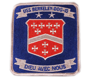 A patch with the crest of a navy ship.