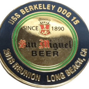 A close up of the back side of a beer bottle cap